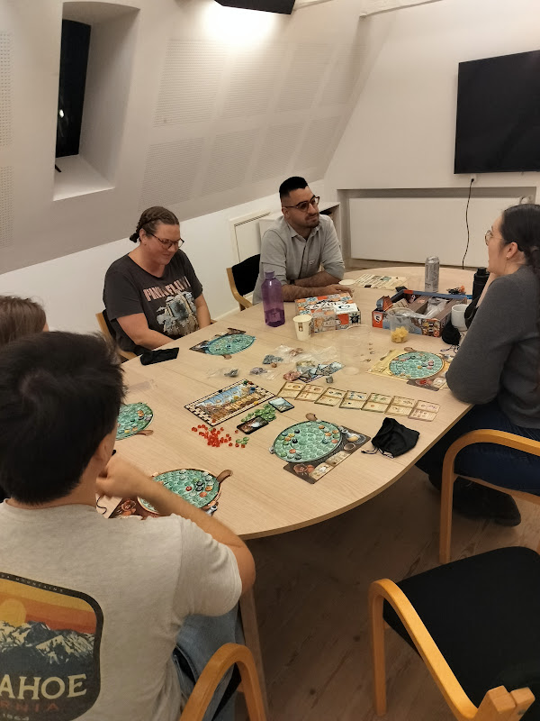 People playing board games