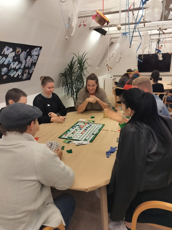 People playing board games