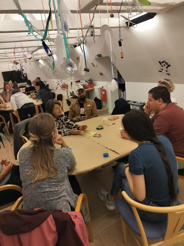 People playing board games